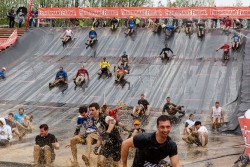 Strongman run slide mud heart of Europe